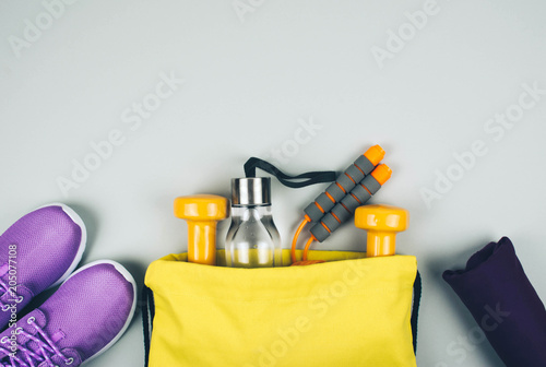 Creative flat lay of sport and fitness equipments