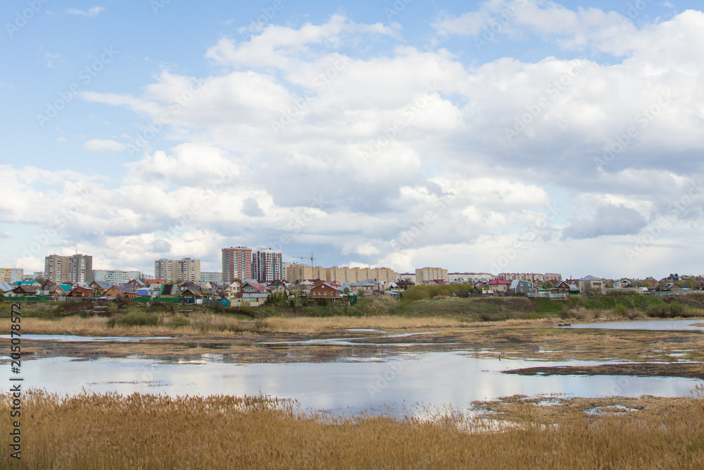 panorama of the city with a lake