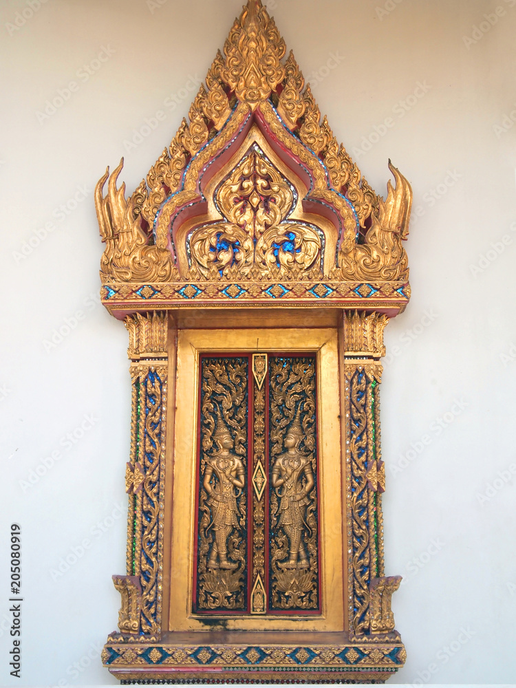 Beautiful golden window in Thai temple