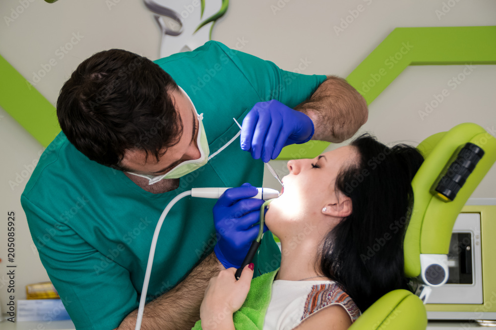 Young woman at dental office. Young woman at dental office.