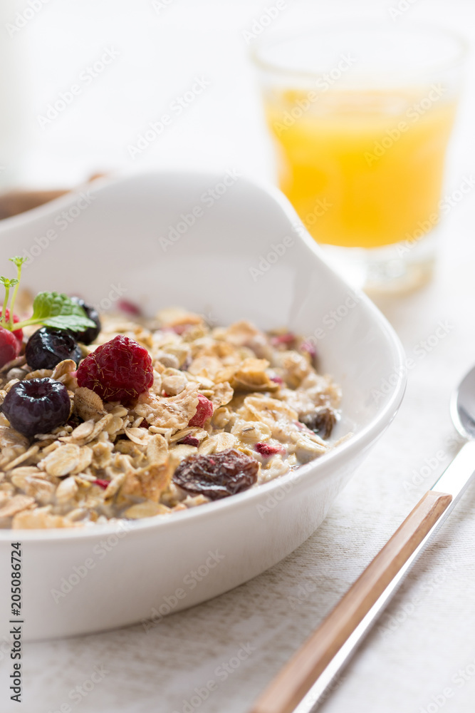 Sunny Morning with Healthy Breakfast. Muesli With Milk, Chia Seeds, Berries and Cinnamon. Sunny Morning with Healthy Breakfast. Muesli With Milk, Chia Seeds, Berries and Cinnamon.