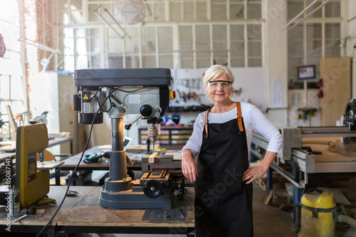 Senior craftswoman in her workshop 