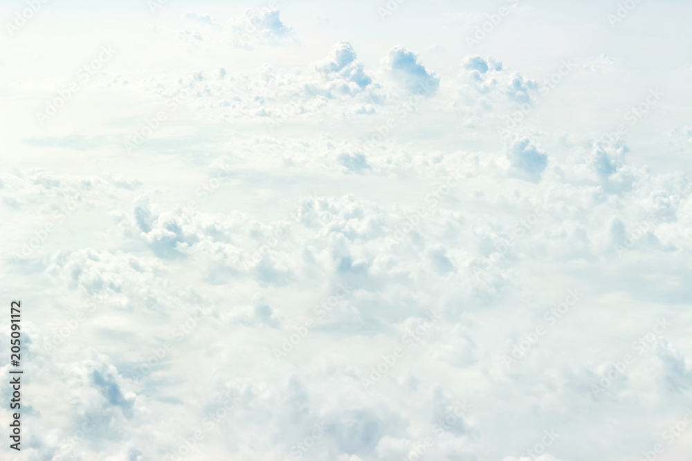 Obraz premium Fluffy Clouds texture. View from the airplane window