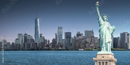 The Statue of Liberty with One World Trade Center background, Landmarks of New York City, USA © spyarm