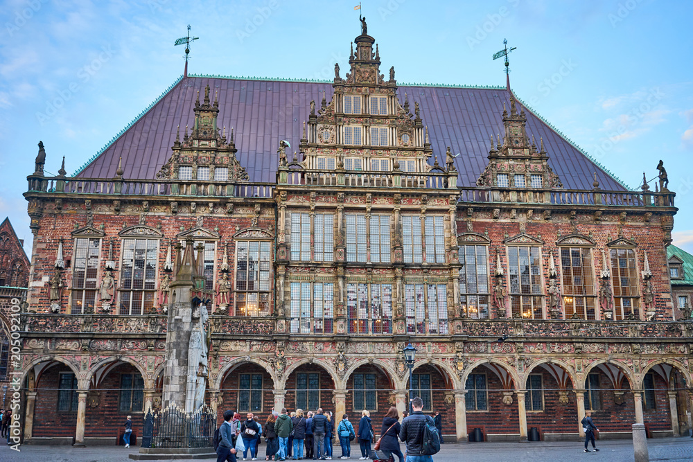 View on the Market square with Town Hall and Statue of Roland in the evening in Bremen, Germany