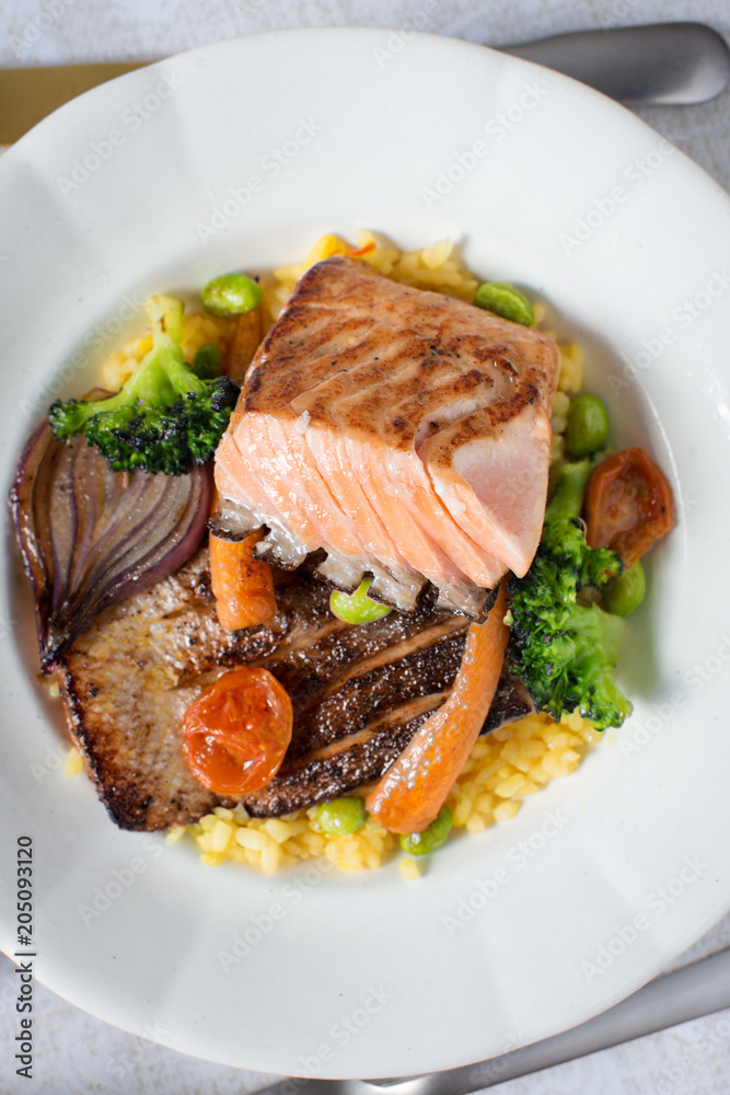 Grilled Salmon Steak with Vegetables on White Plate. Healthy Food.