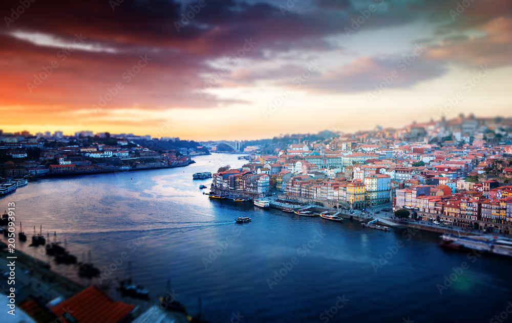 Porto, Portugal old town skyline at sunset, beautiful cityscape Tilt shift image