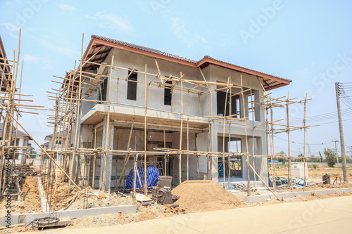 house under construction with autoclaved aerated concrete block structure at building site