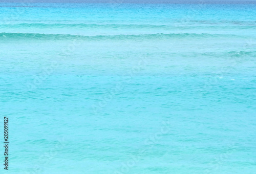 Background of a bright turquoise sea water