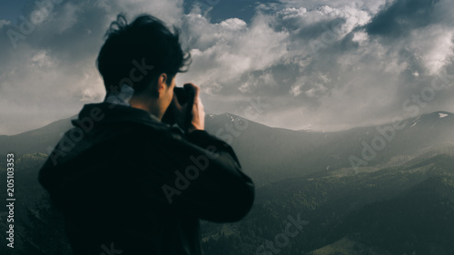 Incredible mountains. Photographer at work. Focus on the mountains. Photos of the mountain