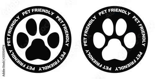 Pets allowed sign. Black and white paw symbol in circle with pet friendly text written on it.