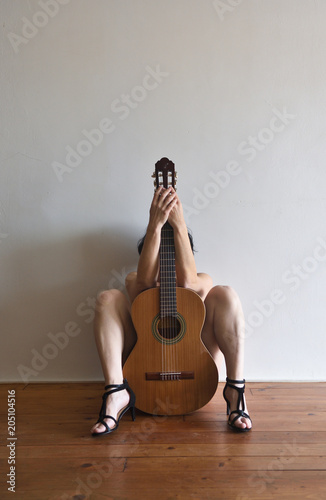 portrait of a woman with a guitar