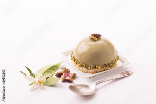 Dessert with pistachio isolated on white background