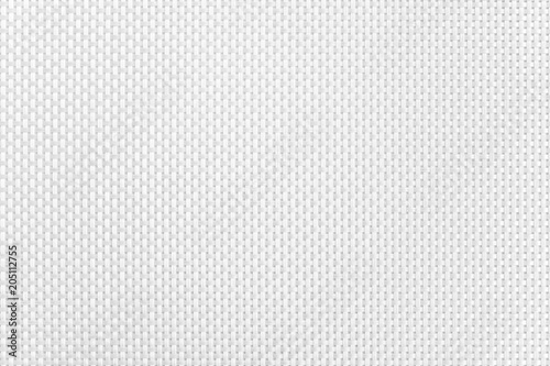 Surface of a white synthetic napkin with a large pattern. Background image, texture