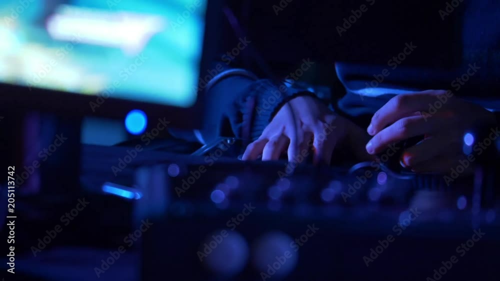 Close up, person plays videogames on computer Close up, person plays videogames on computer