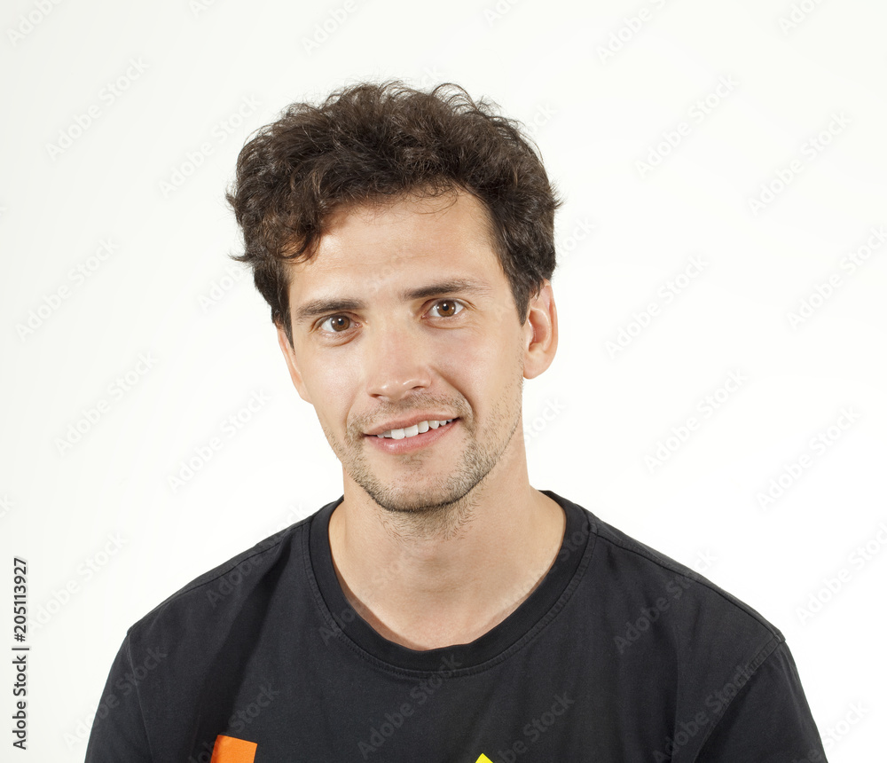 Smiling young boy posing to camera