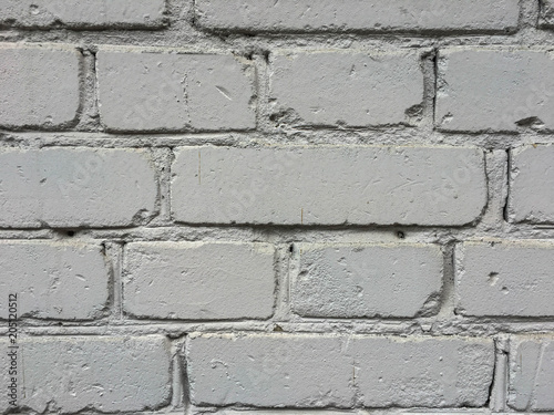 White painted brick texture background with cracks