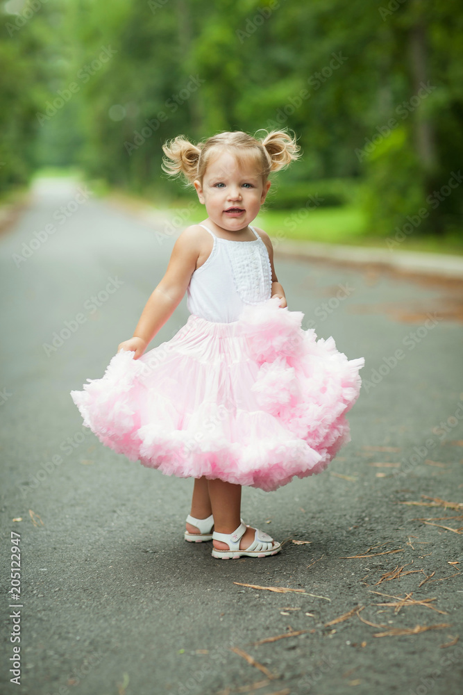 Pretty Preschool Blond Little Girl with Pigtails in Pink Skirt Stock ...