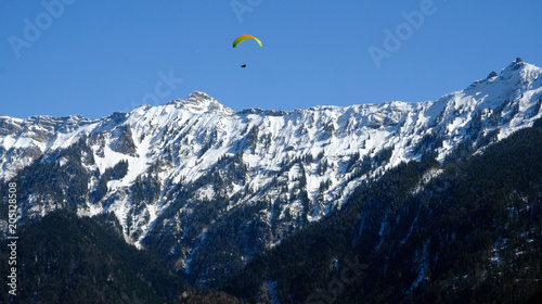 Paragliding over the Swiss Alps near Interlaken