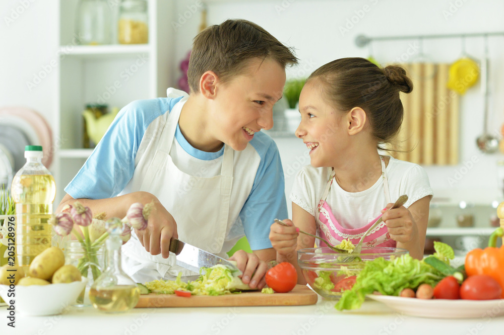 brother and sister preparing