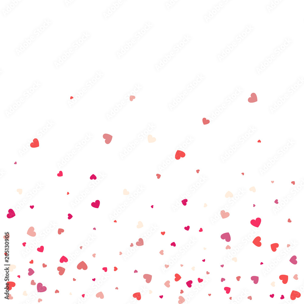 Heart confetti of Valentines petals falling on white  background. Flower petal in shape of heart confetti for Women's Day