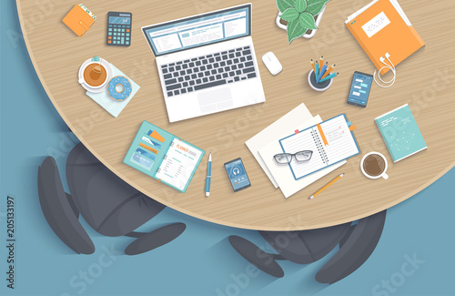 Top view of modern stylish round wooden desk in office, chairs, office supplies, laptop, folder, headphones, phone, pen, paper, coffee, tea, book. Vector illustration 