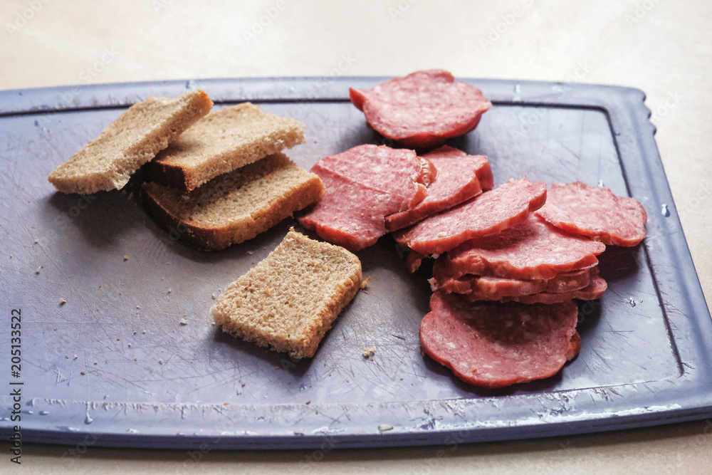 sausage and bread cut into pieces