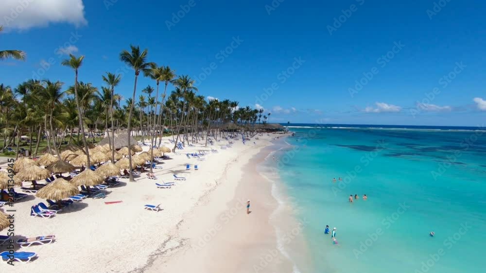 Bora Bora, French Polynesia, top view of palms beach with white sand. Hotel on the beach thatched roofs . Hawaii beach chairs. Beautiful beach, palm trees. Vacation shore of the ocean. Island. Summer Bora Bora, French Polynesia, top view of palms beach with white sand. Hotel on the beach thatched roofs . Hawaii beach chairs. Beautiful beach, palm trees. Vacation shore of the ocean. Island. Summer