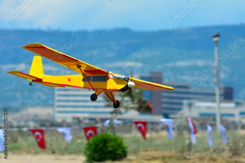 Homemade radio control aircraft  on blue sky.