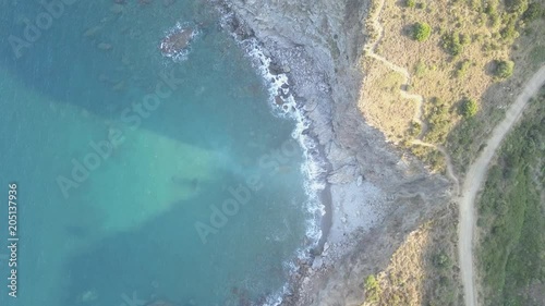 Wallpaper Mural Waves on coastal cliffs, overhead aerial Torontodigital.ca
