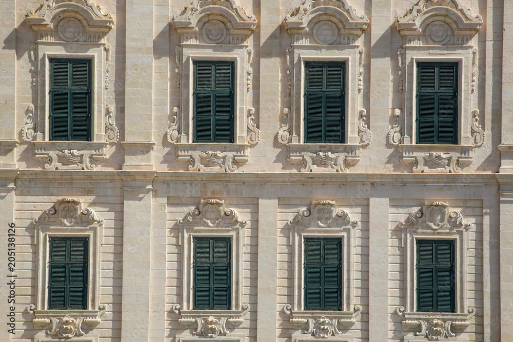 Fototapeta premium Green windows, old facade, architecture of Valletta, Malta