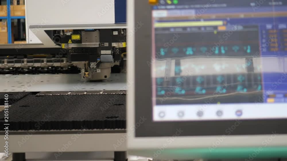 Close up, cnc machine used in oven factory Close up, cnc machine used in oven factory