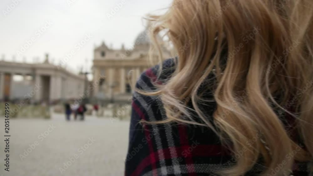 Young woman in Vatican city and St. Peter's Basilica church, Rome, Italy. Travel tourist girl outdoors during holidays in Europe. Slow motion. Steadycam shot. Young woman in Vatican city and St. Peter's Basilica church, Rome, Italy. Travel tourist girl outdoors during holidays in Europe. Slow motion. Steadycam shot.