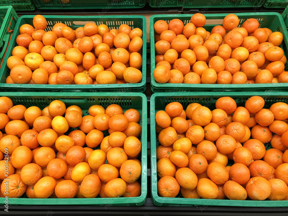 lot of tangerines in the boxes close-up