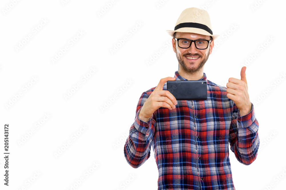 Young handsome bearded tourist man ready for vacation Young handsome bearded tourist man ready for vacation
