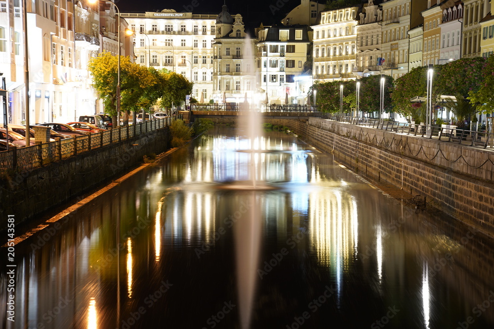 View at the beautiful streets and the river in Calrsbad (Karlovy Vary), Czech Republic at night
