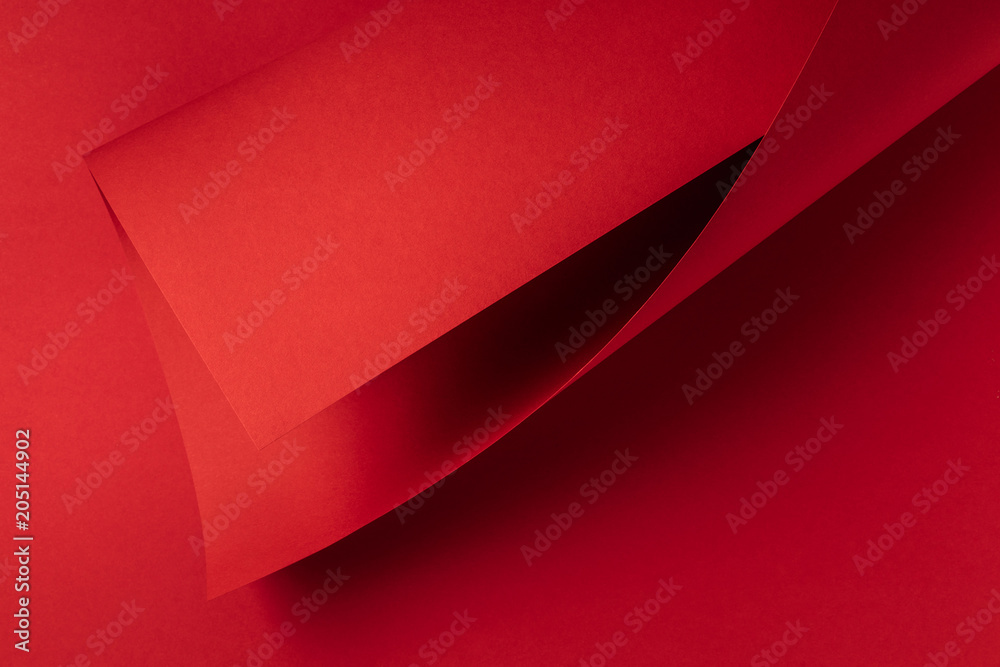 Obraz premium close-up view of bright red abstract paper background