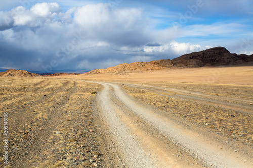 Road through the steppe and mountains of Western Mongolia.