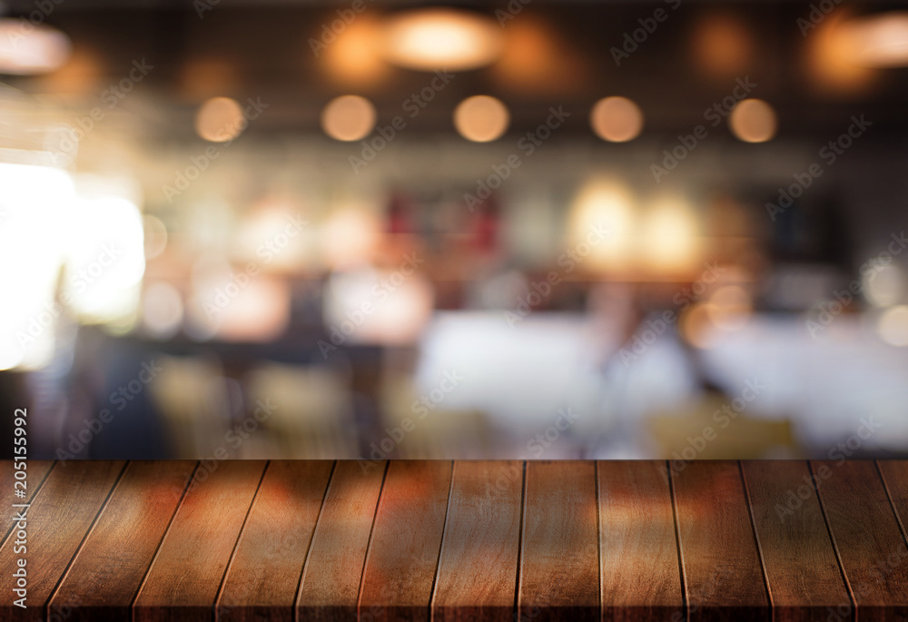 Wooden board empty table cafe, coffee shop, bar blurred background can be used for display or montage your products and Mock up Wooden board empty table cafe, coffee shop, bar blurred background can be used for display or montage your products and Mock up