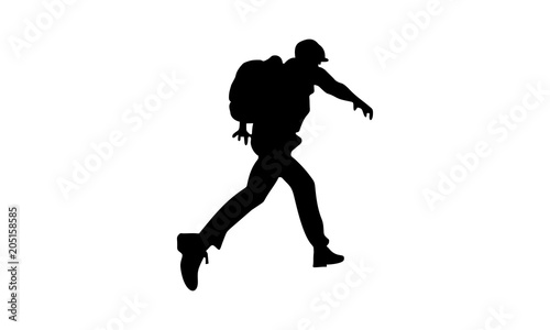the image of a male silhouette ran and jumped between the rocks