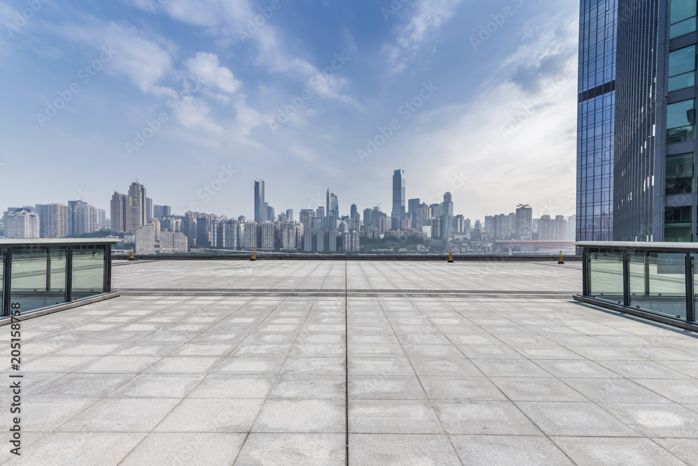 Panoramic skyline and buildings with empty concrete square floor，chongqing city，china