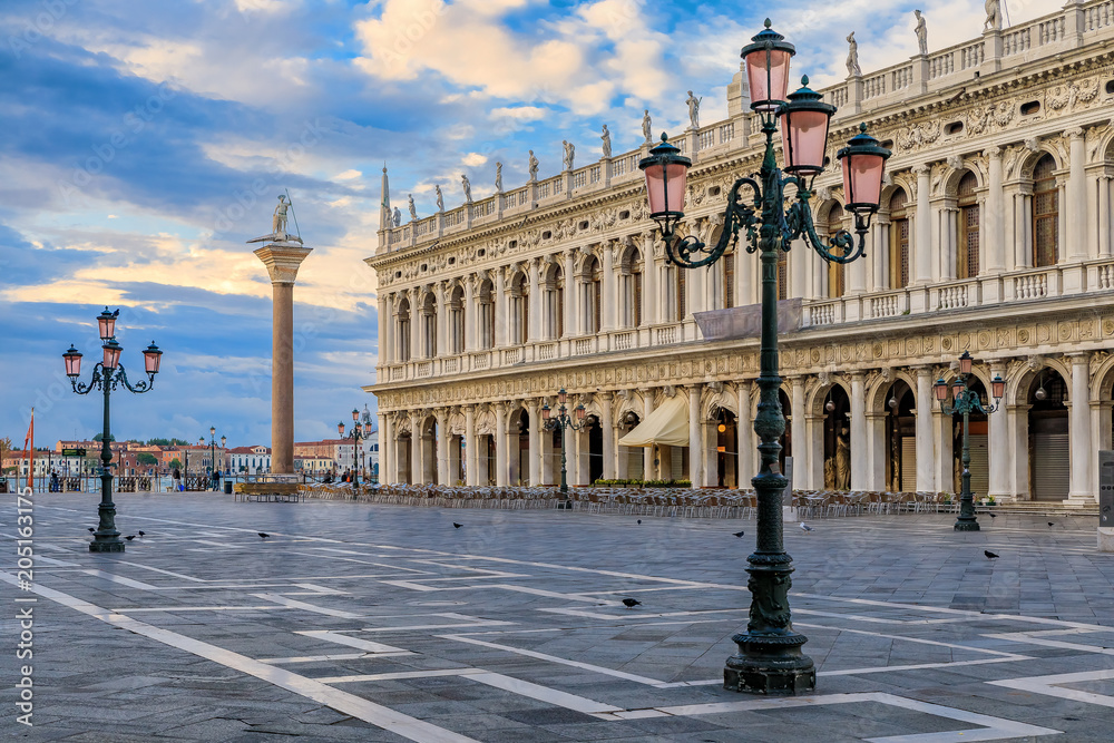 Fototapeta premium The picturesque National Library of St Mark's on Piazza St Marco or Saint Mark's square at sunrise in Venice Italy