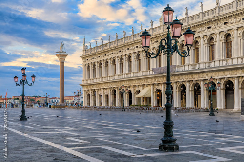 The picturesque National Library of St Mark's on Piazza St Marco or Saint Mark's square at sunrise in Venice Italy photo