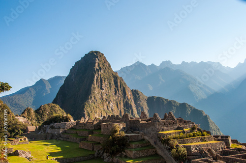 View of the amazing Machu Picchu, the lost Incan city, Wayna Picchu and mountains. Machu Picchu is One of the New Seven Wonders of the world. Peru