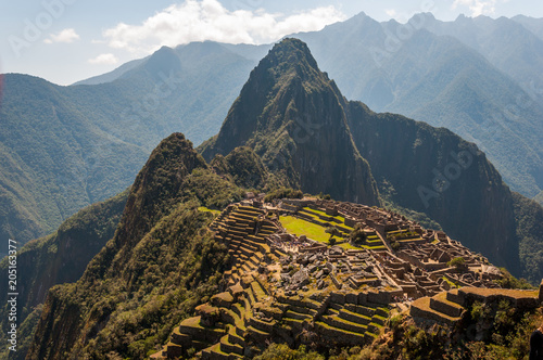 View of the amazing Machu Picchu, the lost Incan city,  Wayna Picchu and mountains.  Machu Picchu is One of the New Seven Wonders of the world. Peru