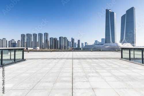 Panoramic skyline and buildings with empty concrete square floor，chongqing city，china