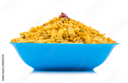 Indian Delicious And Crunchy Mix Namkeen Food Also Know As Mixture, Chivda, Farsan, Namkin, Nimco or Nimko Made of Gram Flour And Mixed With Dry Fruits isolated on White Background photo