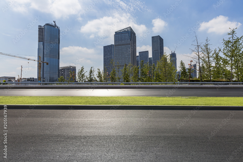 Empty Road with modern business office building Empty Road with modern business office building