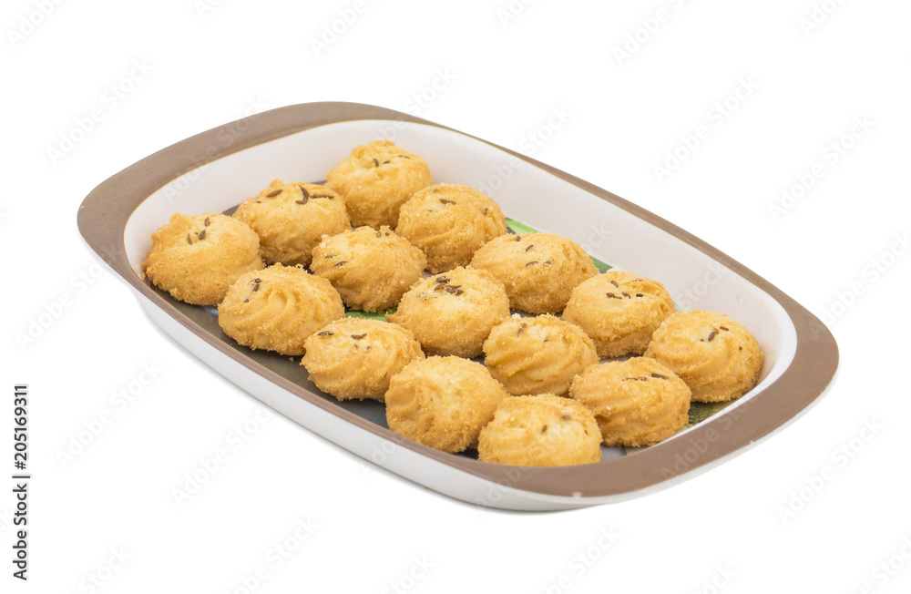 Salted Flavor Small Cumin Cookies or Biscuits Also Know as Nan Khatai or Jeera Cookies is a tea time Snack. Little Sweet and Little Salty isolated on White Background Salted Flavor Small Cumin Cookies or Biscuits Also Know as Nan Khatai or Jeera Cookies is a tea time Snack. Little Sweet and Little Salty isolated on White Background