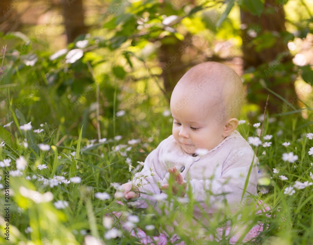 Beautiful infant baby girl portrait in nature Beautiful infant baby girl portrait in nature